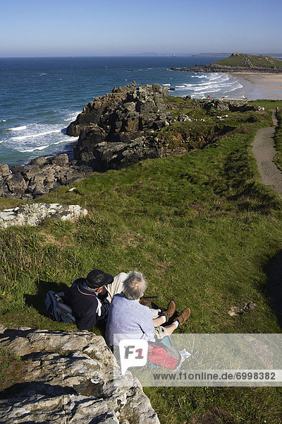 Couple Resting  Porthmeor Beach  Saint Ives  Cornwall  England  United Kingdom