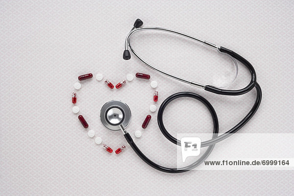 Pills in Heart Shape with Stethoscope