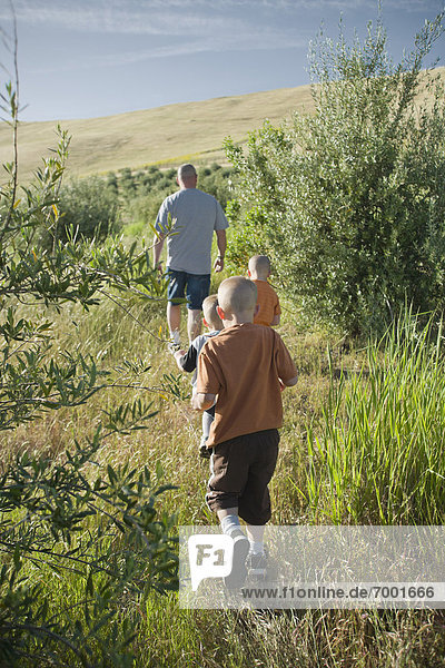 Father and Sons Walking  Livermore  Alameda County  California  USA