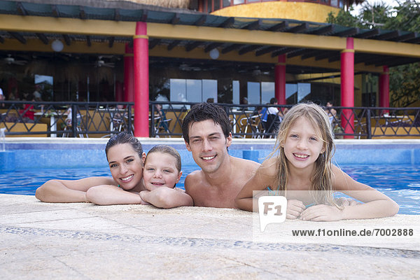 Family in Swimming Pool  Reef Playacar Resort and Spa  Playa del Carmen  Mexico