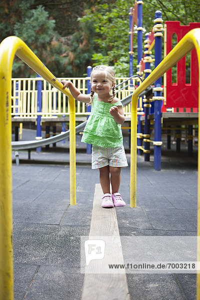 Girl Playing in Washington Park Playground  Portland  Oregon  USA