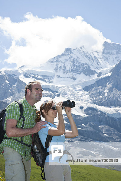 Couple Looking at View  Bernese Oberland  Switzerland
