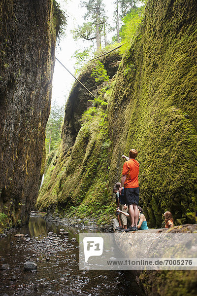 People Hiking in Oneonta Gorge  Oregon  USA