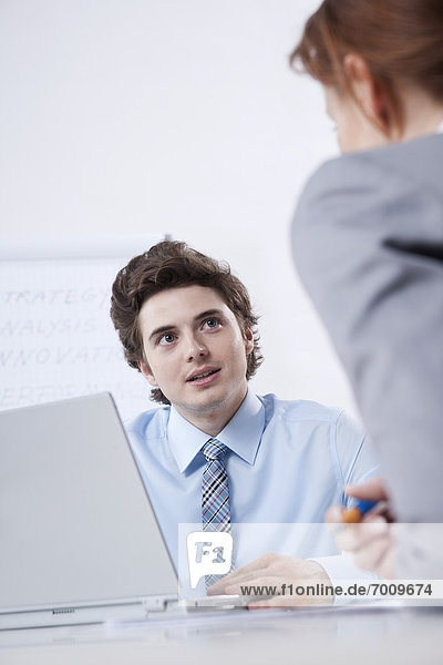 Young Businessman Meeting with Businesswoman