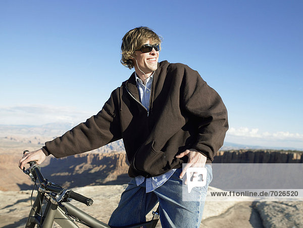 Young man with mountain bike