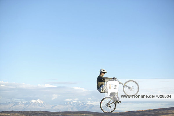 Man jumping with mountain bike