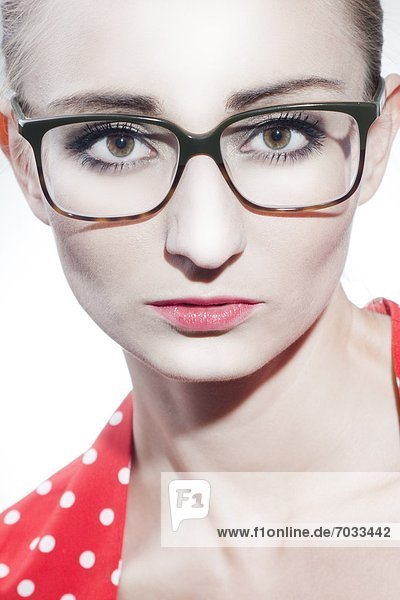 Blond young woman with glasses  portrait