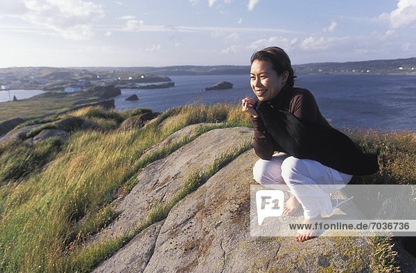 Woman On A Rock  Champney's  Newfoundland  Canada