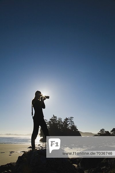 Young Woman Taking Photos  Chesterman's Beach  Tofino  British Columbia  Canada