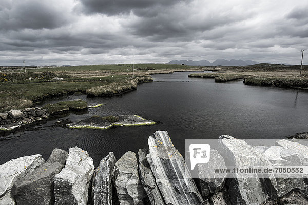 Steinmauer  Europa  Himmel  dramatisch  Fluss  Connemara  Irland