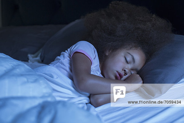 Mixed race girl sleeping