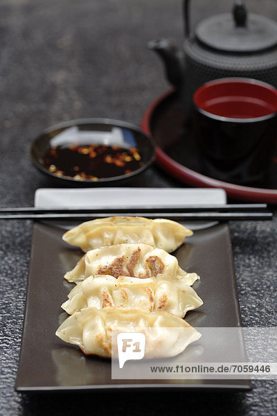 Asian fried dumplings on tray