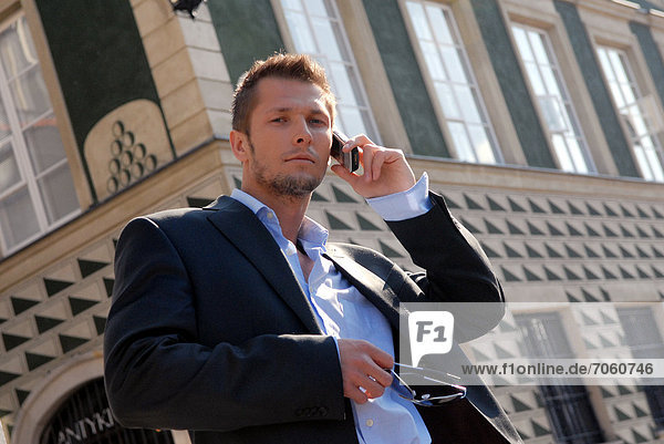 Man using a cell phone.