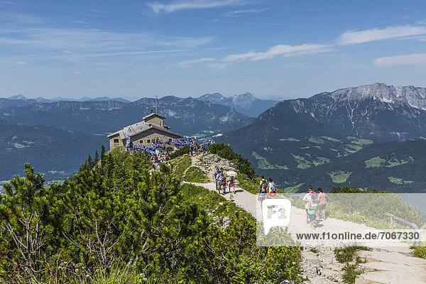View from the summit cross towards Kehlsteinhaus or Eagle's Nest and the Alps  Berchtesgaden  Bavaria  Germany  Europe
