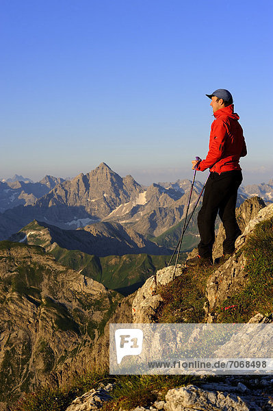 Mountain climber with a mountain panorama  Geisshorn Mountain  Tannheim Valley  Tyrol  Austria  Europe