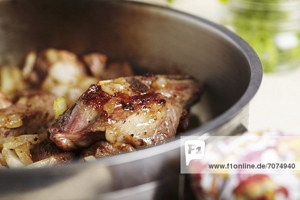 'Lamb and Onions in a Pot