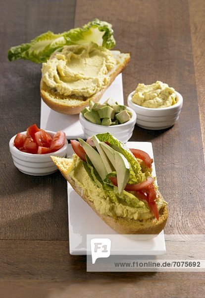 Avocado cream and tomato sandwich