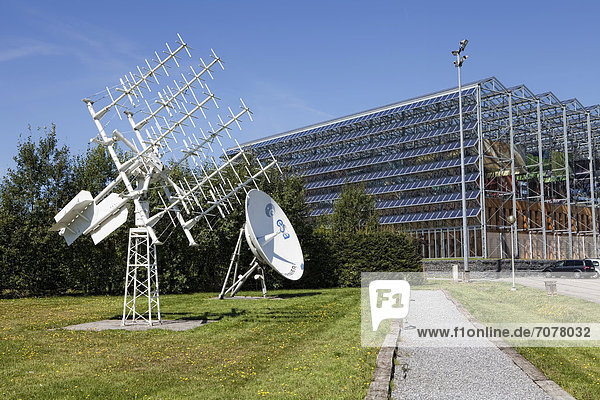 Parabolic antenna of the European Communications Satellite  ECS  for communications satellites operated by Eutelsat and a high-frequency antenna from ESA  European Space Agency  1980s  Euro Space Center  Transinne  Belgium  Europe1