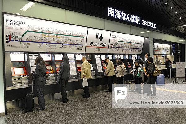 Ticket machines with a plan for the railway station above them with rates for purchasing tickets  Nambai Namba Railway Station in Osaka  Japan  East Asia  Asia