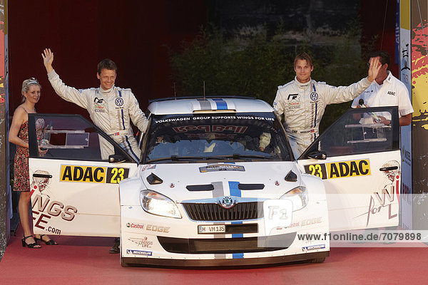 Andreas Mikkelsen  right  and Ola Floene starting at the Porta Nigra in a Skoda vehicle to the ADAC Rally Germany  Trier  Rhineland-Palatinate  Germany  Europe