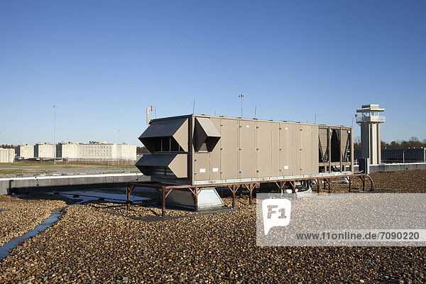 HVAC ventilation system or unit at a Correctional Facility. A view over the prison complex.