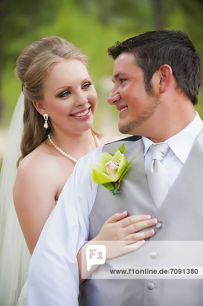 USA  Texas  Bride and groom smiling  close up