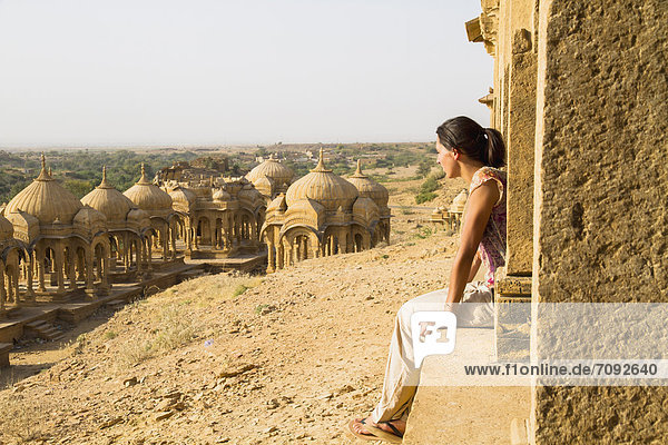 India  Rajasthan  Jaisalmer  Tourist at Bada Bagh Cenotaphs