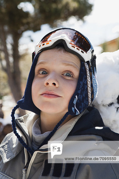 Boy wearing ski goggles  portrait