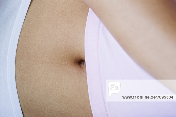 Close-up of woman's abdomen