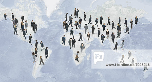 Large group of businesspeople walking on world map