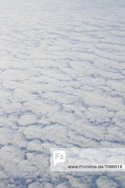 Wolkenteppich vom Flugzeug aus gesehen