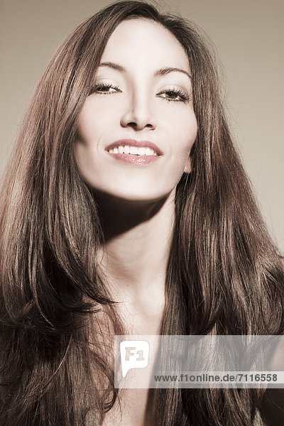 Long-haired brunette woman  portrait