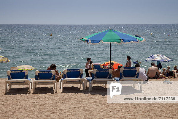 Tourists on the beach  Blanes  La Selva  Costa Brava  Catalonia  Spain  Europe  PublicGround