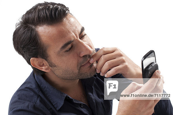 Man looking at a mobile phone