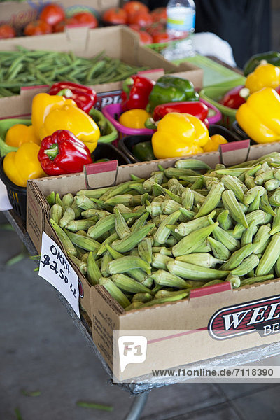 Okra and peppers on sale at Eastern Market  a large farmers market  Detroit  Michigan  USA