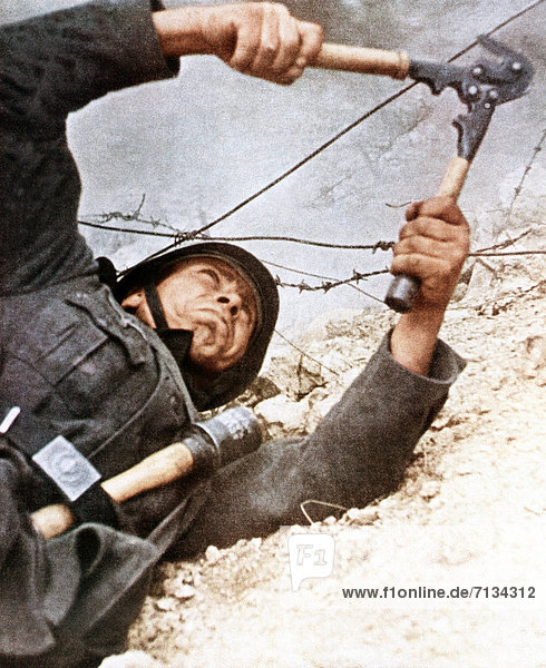 Operation  Barbarossa  Wehrmacht  soldier  cutting  barbed wire  invasion  USSR  World War II  1942 grenade