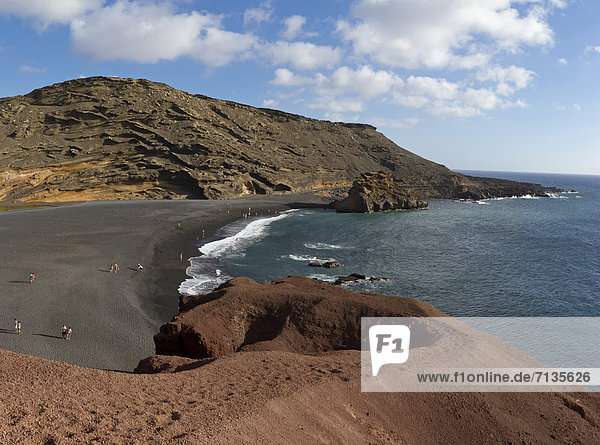 Spain  Lanzarote  El Golfo  Black lava-beach  landscape  water  summer  beach  sea  people  Canary Islands