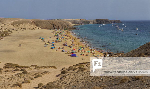 Spain  Lanzarote  Playa Blanca  Playa Mujeres  landscape  summer  beach  sea  people  Canary Islands