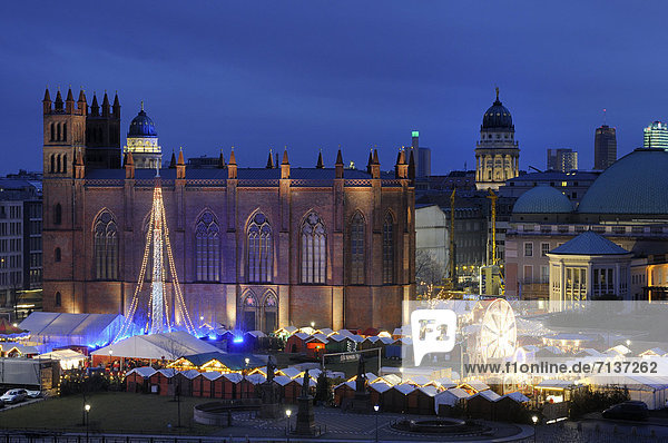 Christmas market at Opera Palais with the Friedrichswerderscher Church and domes of a French Cathedral and German Cathedral on Gendarmenmarkt square  high-rise buildings from the Sony Center  Berlin Mitte  Berlin  Germany  Europe