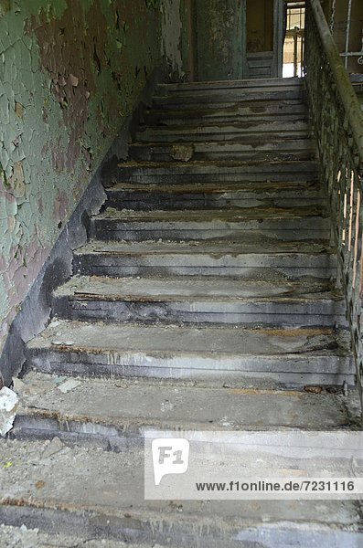 Staircase in a dilapidated building
