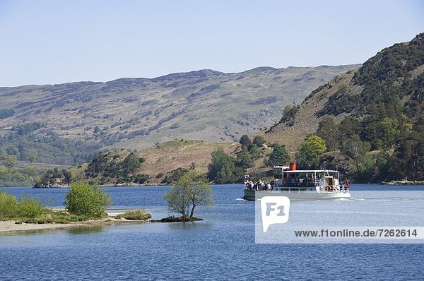 A tourist steamer on Lake Ullswater  Lake District National Park  Cumbria  England  United Kingdom  Europe