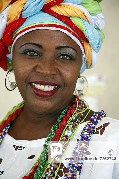 Portrait of a Bahian woman in traditional dress at the Pelourinho district  Salvador  Bahia  Brazil  South America