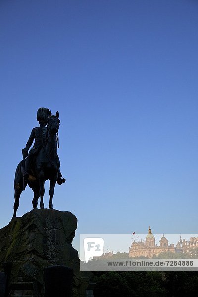 Royal Scots Greys Boer War memorial equestrian statue Princes Street  with the Royal Mile behind  Edinburgh  Scotland  United Kingdom  Europe