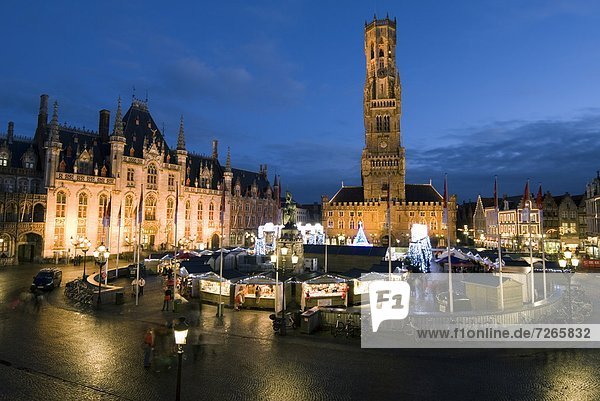 Christmas Market in the Market Square with Belfry behind  Bruges  West Vlaanderen (Flanders)  Belgium  Europe