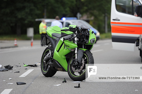 Motorcycle  Kawasaki Ninja standing next to an ambulance at a crash site  Stuttgart  Baden-Wuerttemberg  Germany  Europe