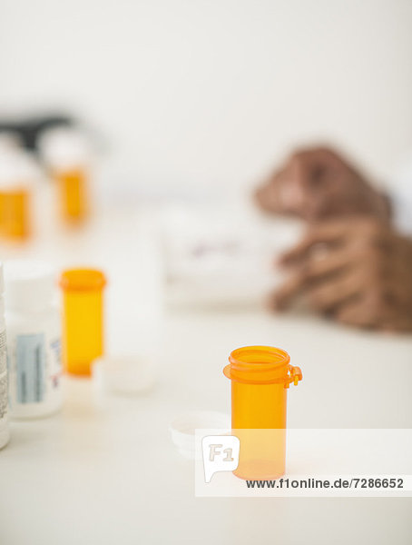 Pharmacist preparing prescription pills