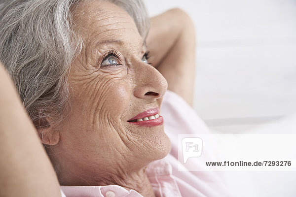 Spain  Senior woman relaxing  smiling