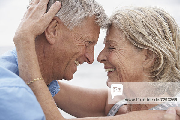 Spain,  Senior couple looking at each other,  smiling