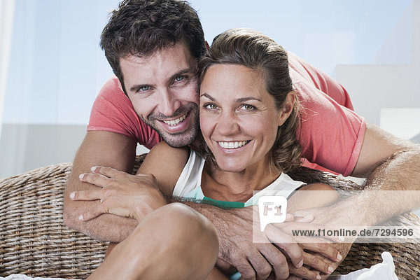 Spain  Mid adult couple smiling  portrait