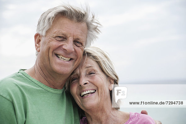 Spain  Mallorca  Seniors couple at beach  smiling